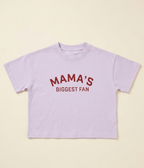 Lavender t-shirt with 'MAMA'S BIGGEST FAN' text on a beige background